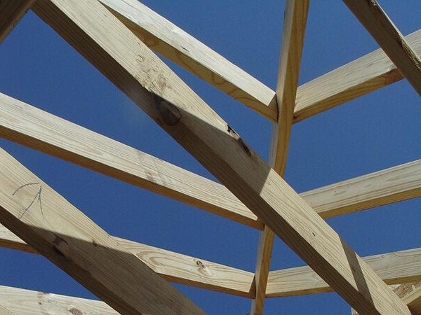 Wood Beams Against Blue Sky